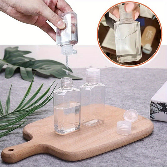 TSA Approved Travel Bottles 2oz Flip Cap 40 Pack Clear Plastic Refillable Squeeze Containers for Hand Sanitizer Shampoo Conditioner Soap Toner Lotion Travel Size Toiletry Bottles
