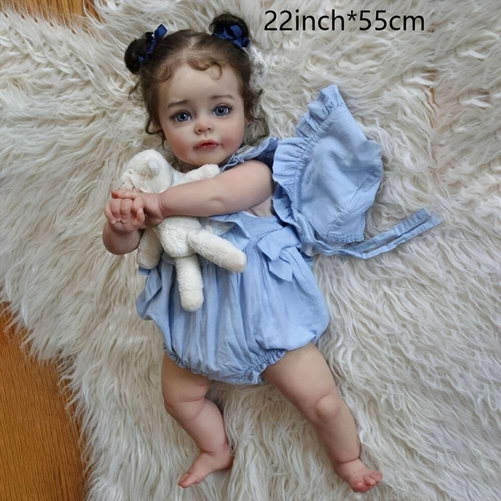 Reborn Baby Doll 48cm Soft Vinyl Toddler Design with Curly Dark Hair, Open Eyes and Blue Outfit