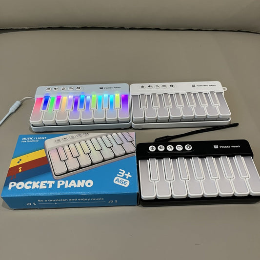 Mini Piano Keyboard, Pink ZJKDQFEN-1, Portable, Pocket-Sized for Basic Music Play detail image
