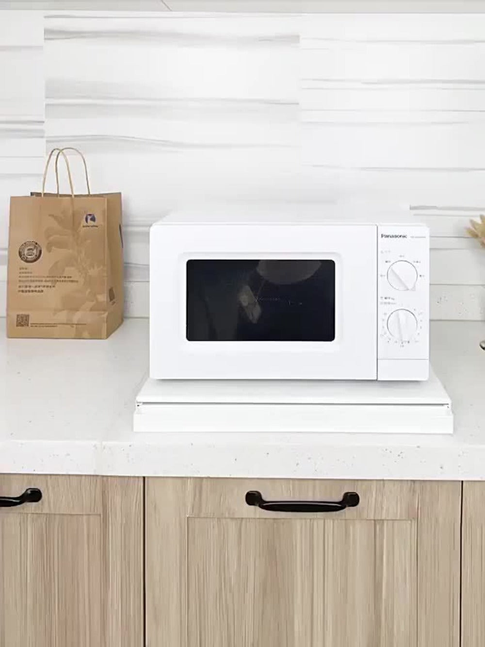 Pull-Out Microwave Stand with Metal Countertop Shelf, 15.4-24.4-Inch Extension and Black or White One- or Two-Piece Sets