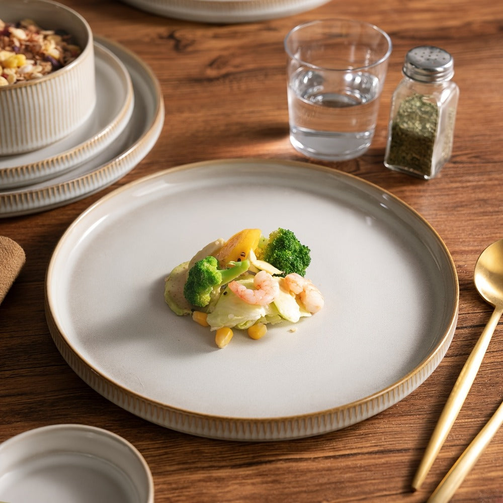 12-Piece Ribbed Dinnerware Set for Four with Dinner Plates, Salad Plates and Cereal Bowls in Two Cream Tones