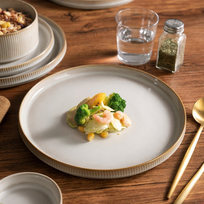 12-Piece Ribbed Dinnerware Set for Four with Dinner Plates, Salad Plates and Cereal Bowls in Two Cream Tones