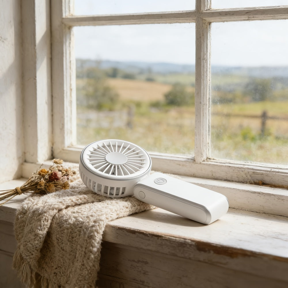 Foldable Handheld and Desk Fan with Three Speeds, USB Charging and White or Blue 1- or 2-Piece Options