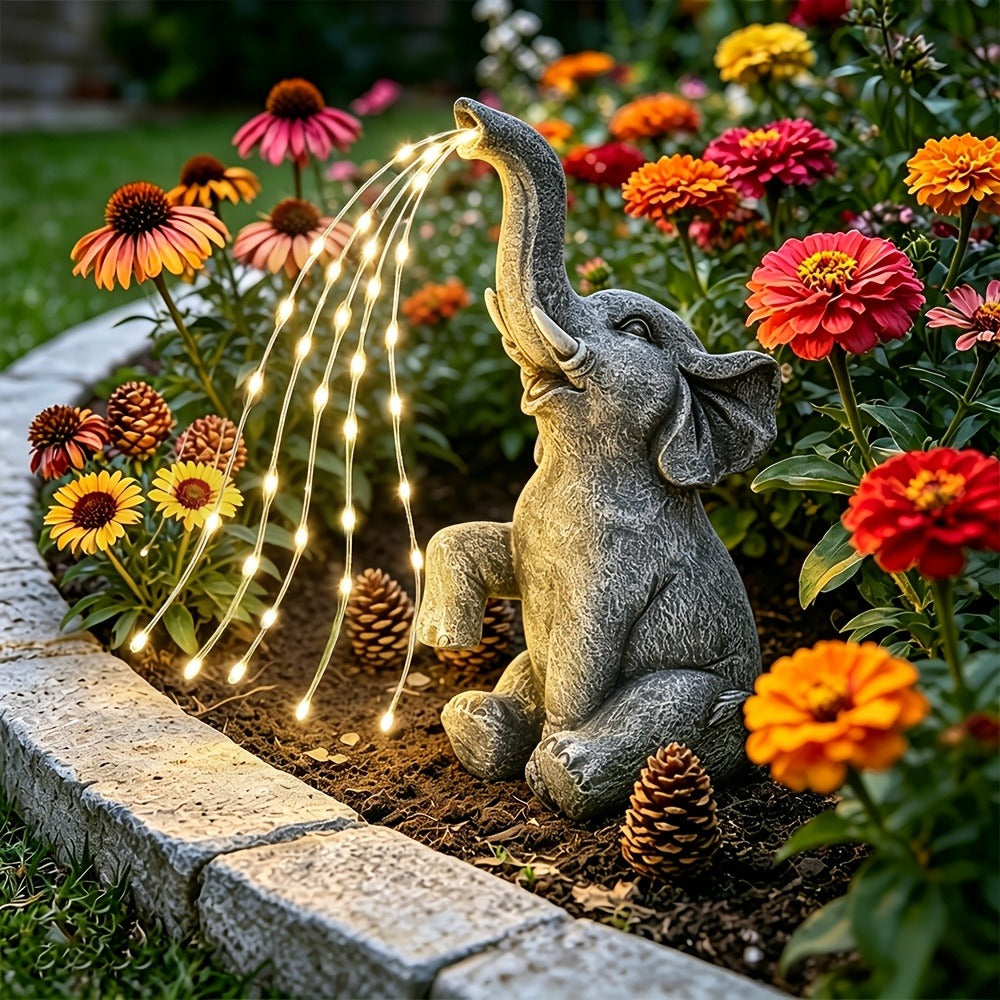 Solar Garden Light Elephant Sculpture with LED Water-Spray Effect, IP44 Rating and Freestanding Display