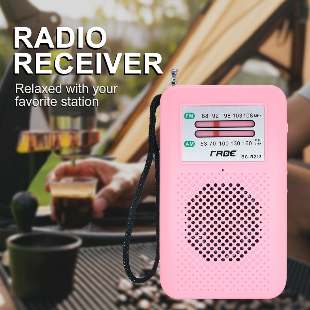 Pocket AM/FM Radio with Manual Tuner, Telescopic Antenna, Wrist Strap and Pink or Black Case