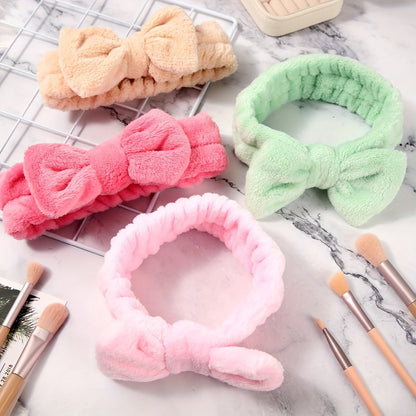 Fifty-Two-Piece Bow Facial Headband Assortment in Thirteen Visible Colors for Group Beauty Routines