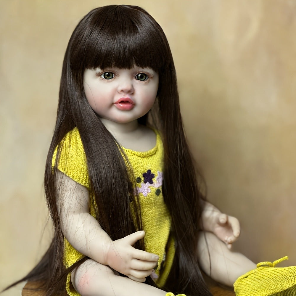 Reborn Baby Doll 22-Inch Full Vinyl Toddler Design with Dark Wig Hair, Acrylic Eyes, Yellow Outfit and Accessories