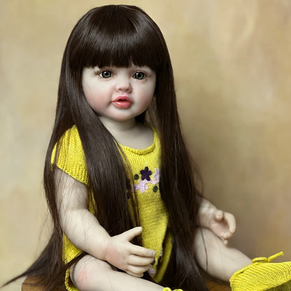 Reborn Baby Doll 22-Inch Full Vinyl Toddler Design with Dark Wig Hair, Acrylic Eyes, Yellow Outfit and Accessories