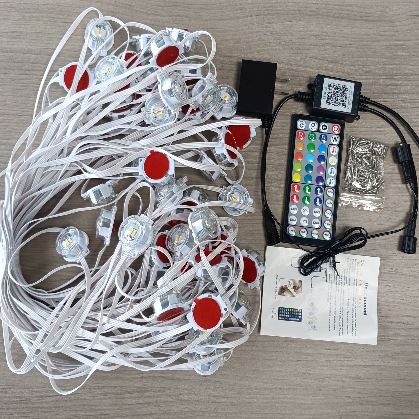 Linked RGB Eave Light Kit from 20ft to 500ft with Plug-In Adapter, App and Handheld Remote