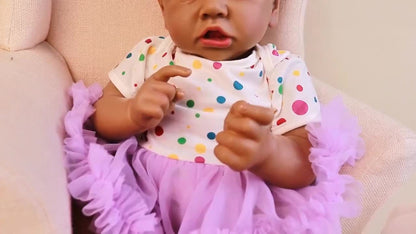 Reborn Baby Doll 21.5-Inch Full Vinyl Design with Curly Dark Hair, Open Eyes and Purple-and-White Outfit