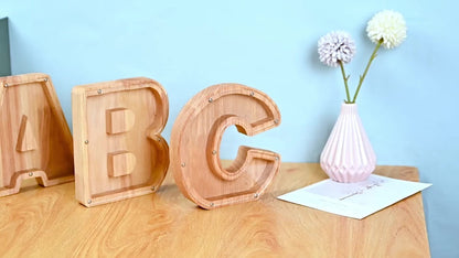 Wooden Alphabet Letter Coin Bank with Clear Front Panel and 23 Fixed Initial Options for Display