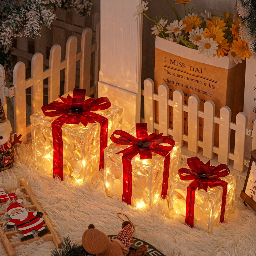 Three Warm-White Light-Up Christmas Gift Boxes with Red Bows, USB Lead and Battery Case Pictured