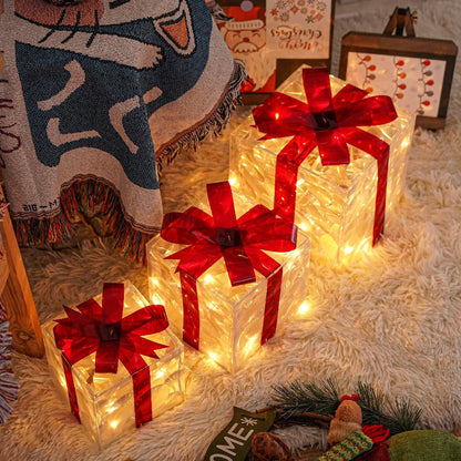 Three Warm-White Light-Up Christmas Gift Boxes with Red Bows, USB Lead and Battery Case Pictured