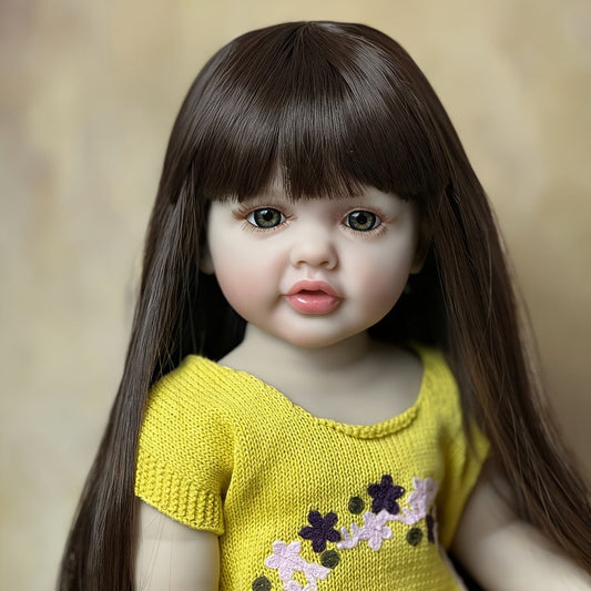 Reborn Baby Doll 22-Inch Full Vinyl Toddler Design with Dark Wig Hair, Acrylic Eyes, Yellow Outfit and Accessories