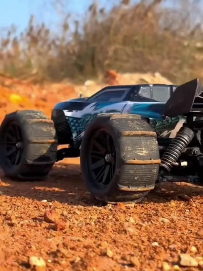 Remote Control Car, Red 4WD Monster Truck with 2.4GHz Control, Large Off-Road Tires and Four-Wheel Drive Layout