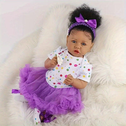 Reborn Baby Doll 21.5-Inch Full Vinyl Design with Curly Dark Hair, Open Eyes and Purple-and-White Outfit
