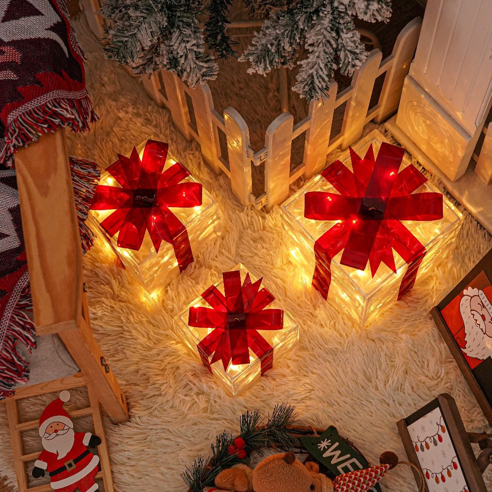 Three Warm-White Light-Up Christmas Gift Boxes with Red Bows, USB Lead and Battery Case Pictured