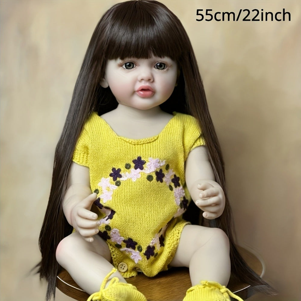 Reborn Baby Doll 22-Inch Full Vinyl Toddler Design with Dark Wig Hair, Acrylic Eyes, Yellow Outfit and Accessories
