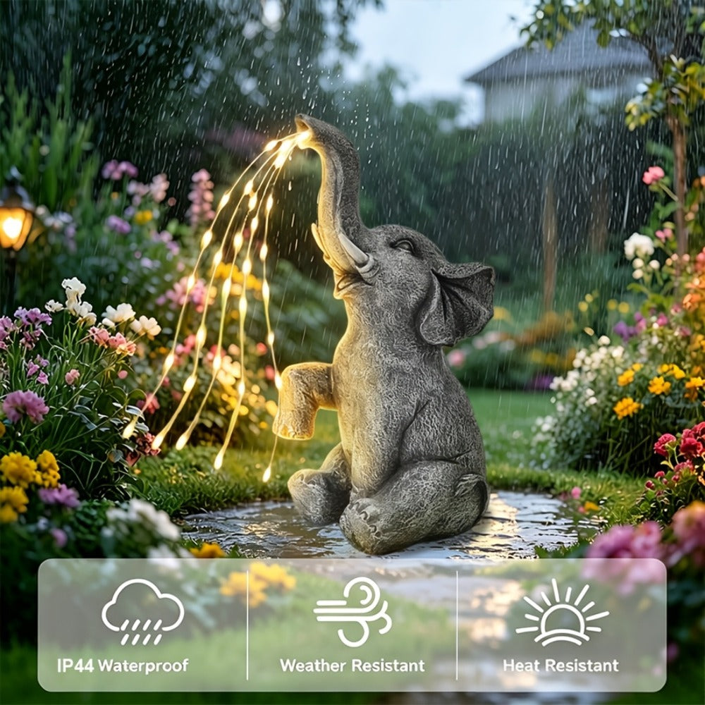 Solar Garden Light Elephant Sculpture with LED Water-Spray Effect, IP44 Rating and Freestanding Display