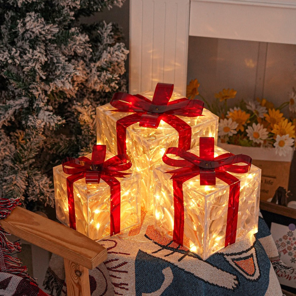 Three Warm-White Light-Up Christmas Gift Boxes with Red Bows, USB Lead and Battery Case Pictured