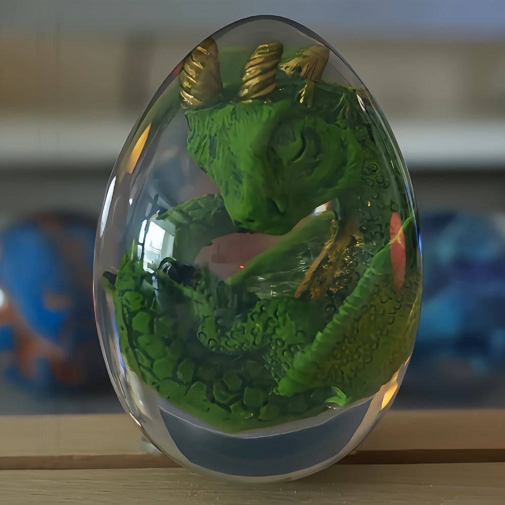 Transparent Dragon Egg Figurine in Red or Green with Oval Resin-Style Display Form Pictured