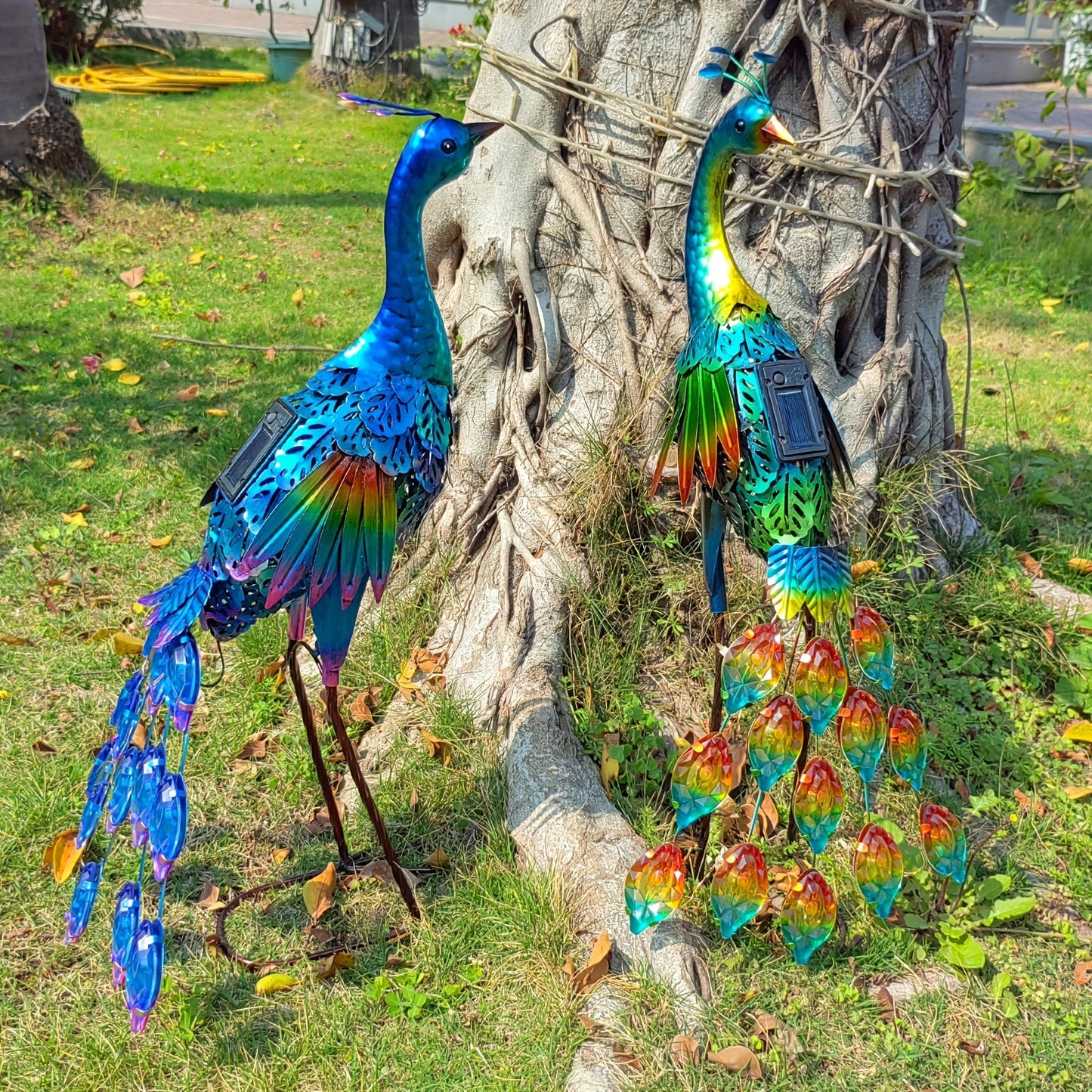 Solar Peacock Garden Statue with Blue Metal-Look Body, Hollow Feather Panels and Flickering Tail LEDs
