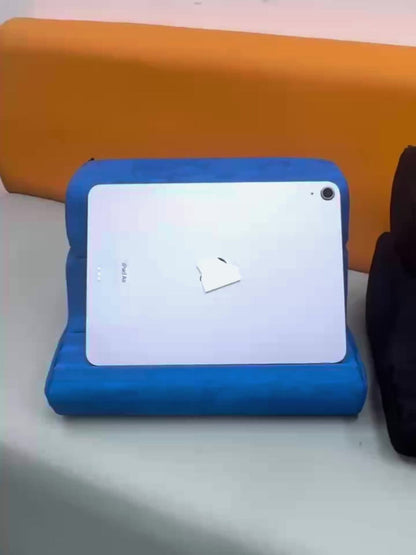 Soft Foldable Tablet Pillow Stand in Black or Blue with Three Viewing Faces, Storage Pockets and 242 × 186 × 290 mm Label