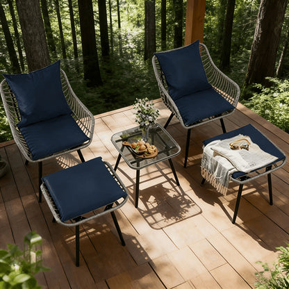 Five-Piece PE Rattan Patio Set with Two Chairs, Two Footstools, Round Glass Table and Gray-Blue Cushions