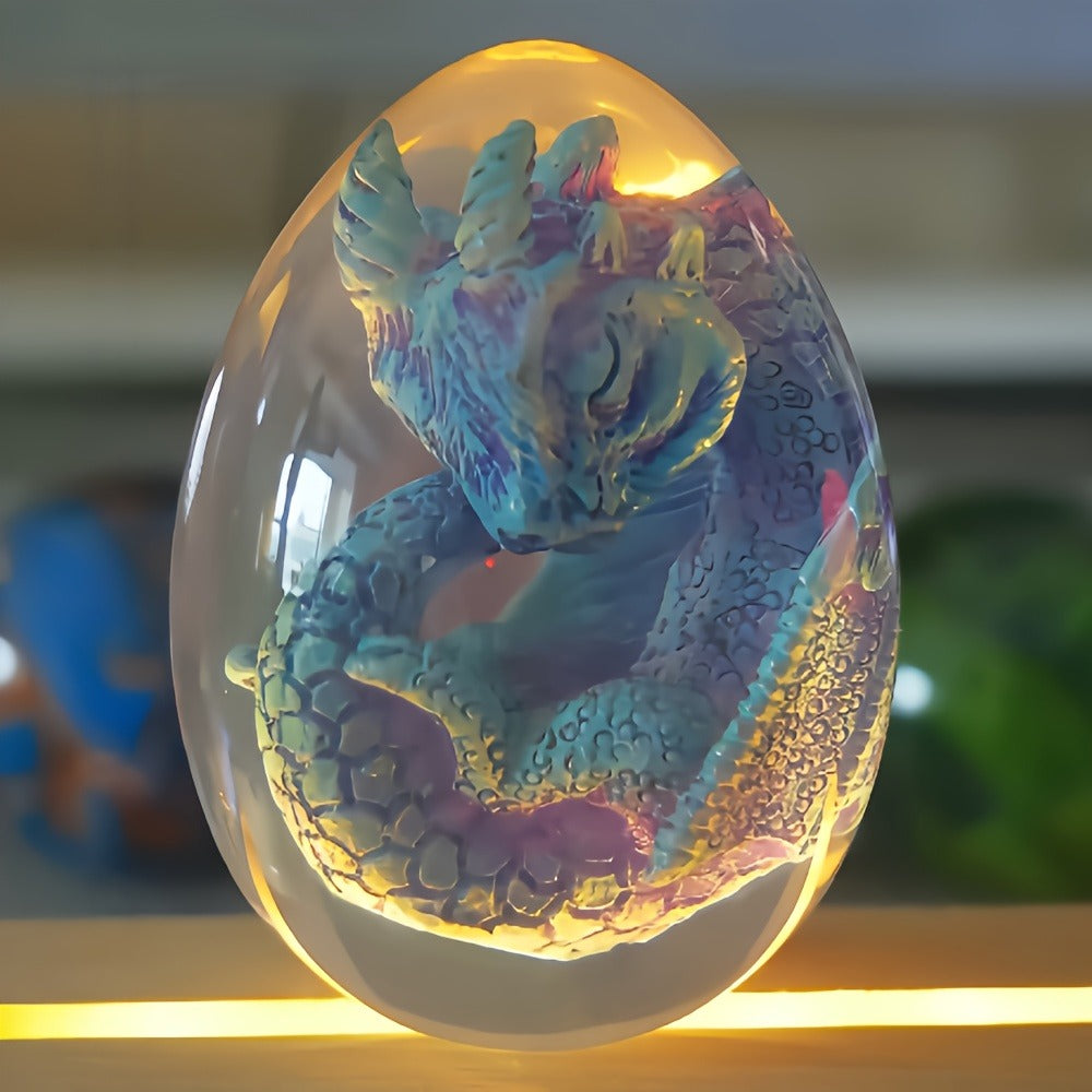 Transparent Dragon Egg Figurine in Red or Green with Oval Resin-Style Display Form Pictured