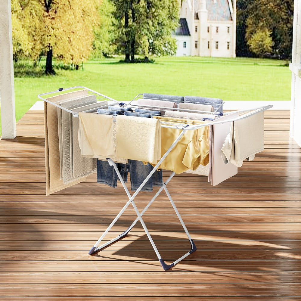 White Four-Wing Folding Clothes Drying Rack with X-Frame, Freestanding Laundry Bars and 55.1 x 37.8-Inch Layout