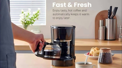 Compact Five-Cup Drip Coffee Maker with 0.75 L Water Tank, Glass Carafe and Reusable Filter