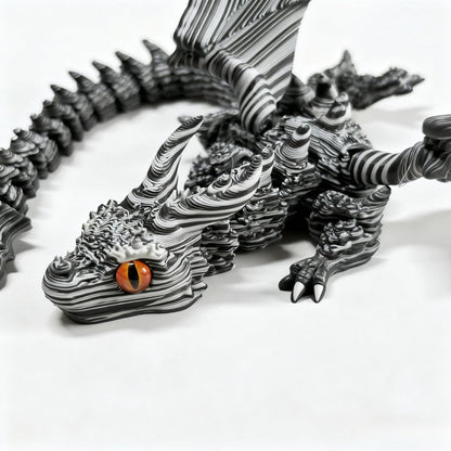 Articulated Black-and-White Swirl Dragon Figurine with Poseable Segments and Random Eye Color for Desktop Display