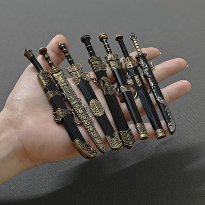 Seven-Piece Miniature Metal Sword Replica Set with Sheaths, Keychains and Ancient-Inspired Display Designs