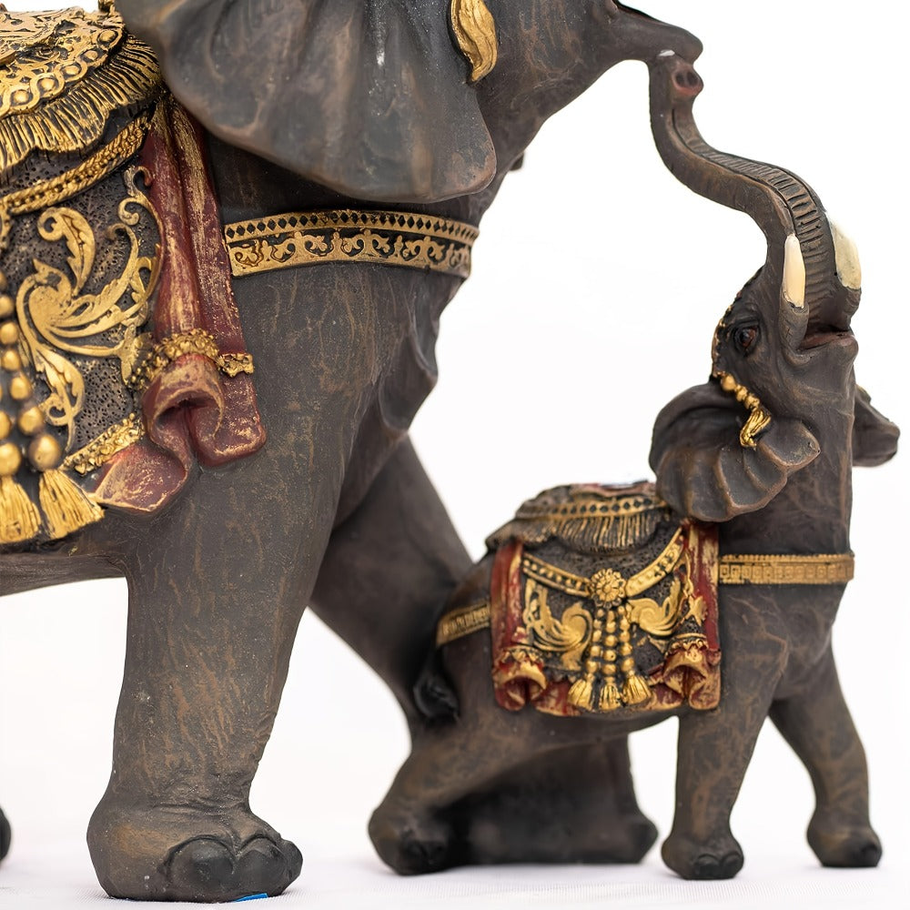 Mama and Baby Elephant Tabletop Figurine in Dark Brown with Raised Trunks and Ornate Gold-Tone Details