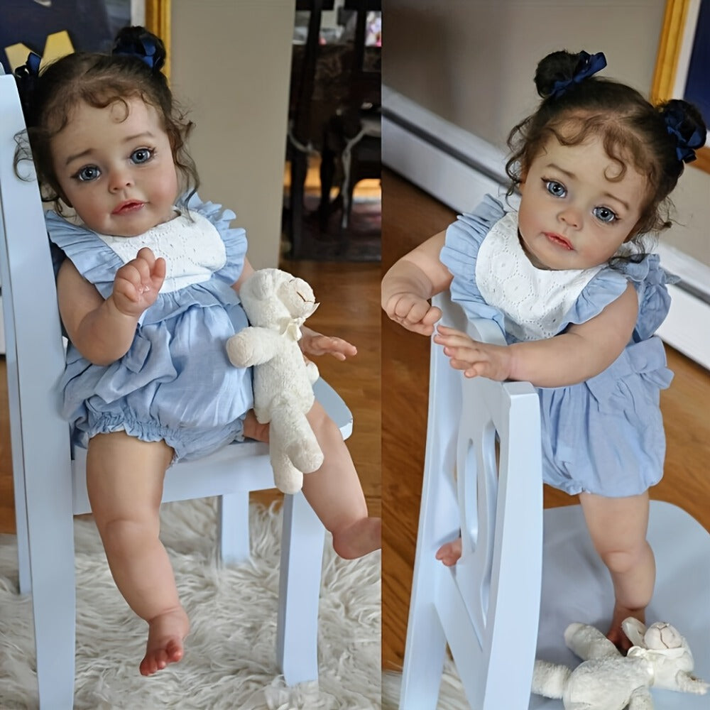 Reborn Baby Doll 48cm Soft Vinyl Toddler Design with Curly Dark Hair, Open Eyes and Blue Outfit