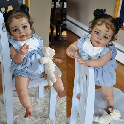 Reborn Baby Doll 48cm Soft Vinyl Toddler Design with Curly Dark Hair, Open Eyes and Blue Outfit