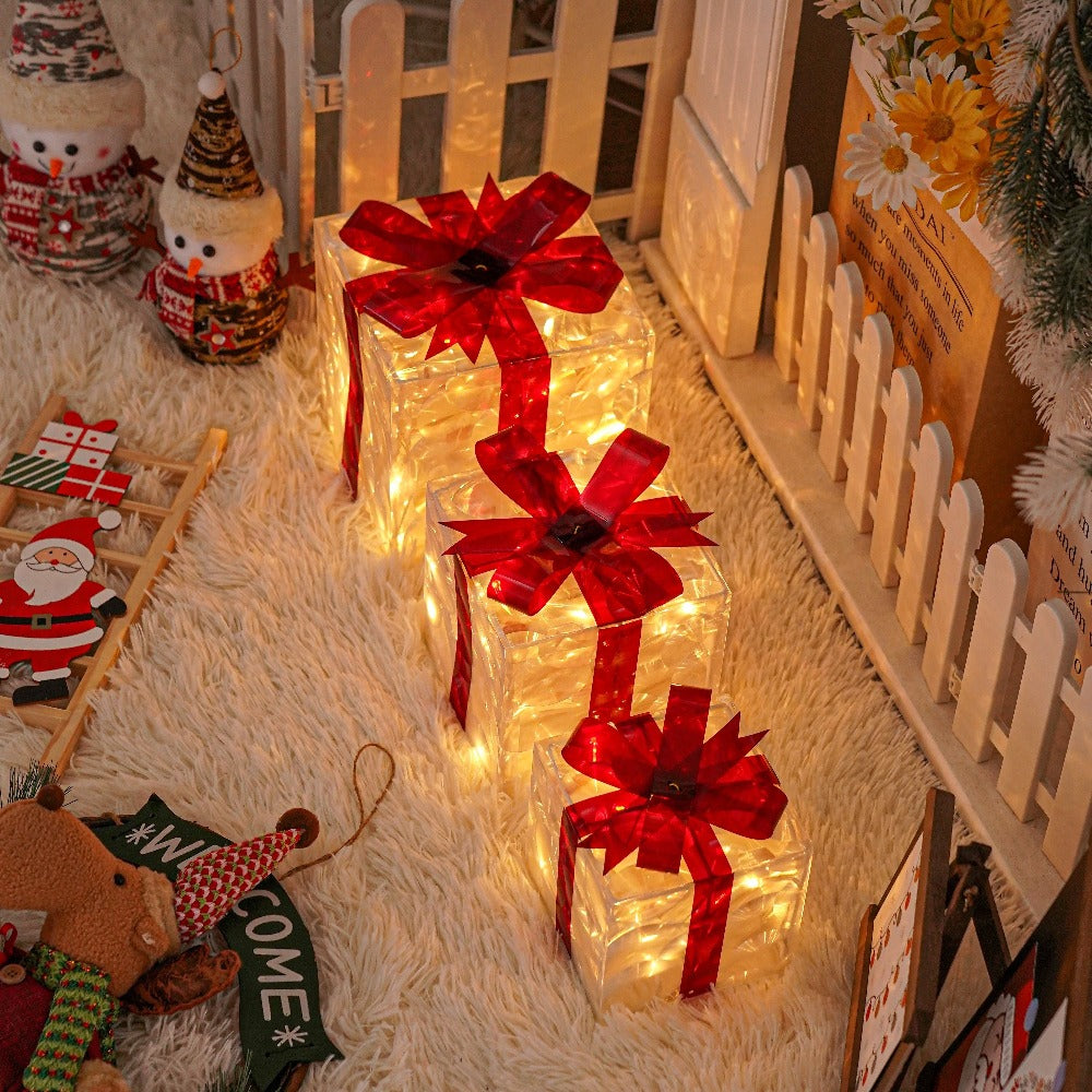 Three Warm-White Light-Up Christmas Gift Boxes with Red Bows, USB Lead and Battery Case Pictured