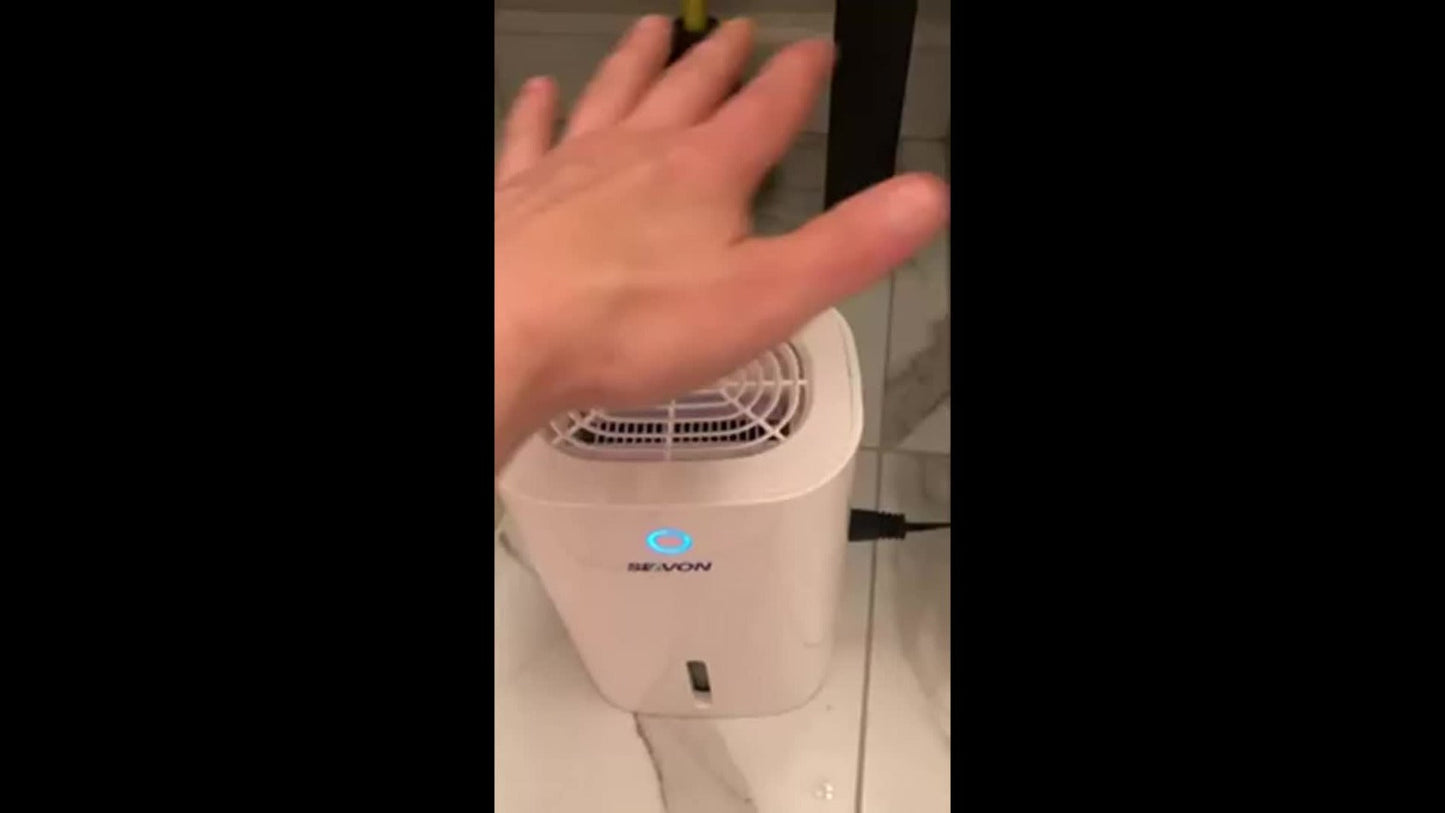 Compact 27-Ounce Peltier Dehumidifier with One-Button Control, Water-Level Window and Full-Tank Shutoff