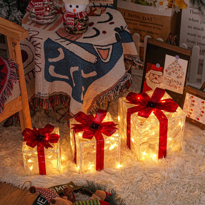 Three Warm-White Light-Up Christmas Gift Boxes with Red Bows, USB Lead and Battery Case Pictured