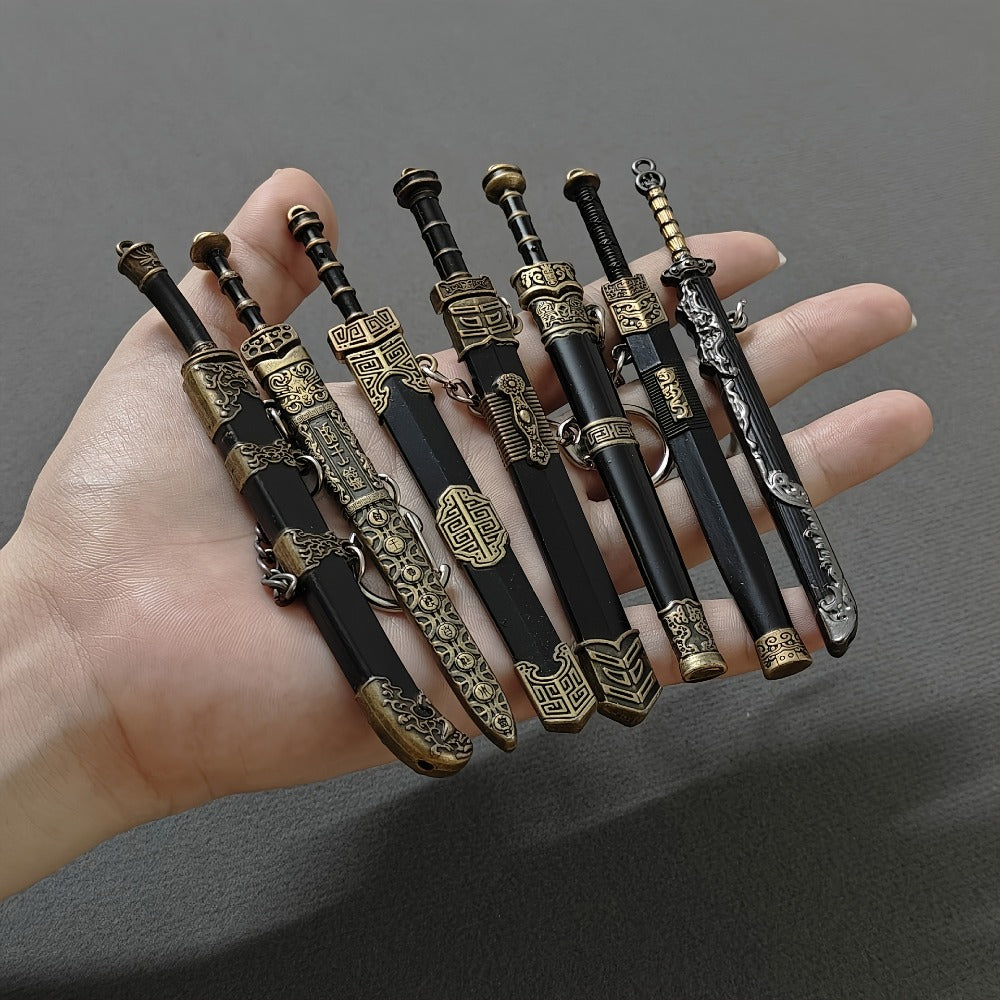 Seven-Piece Miniature Metal Sword Replica Set with Sheaths, Keychains and Ancient-Inspired Display Designs