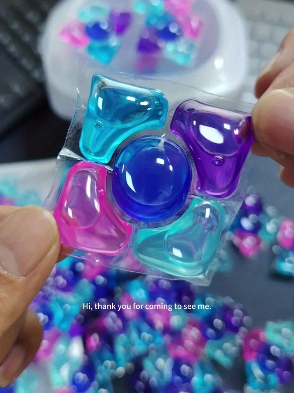Multicolor Laundry Detergent Gel Pods with Portioned Bead Design in 7.05 oz or 21.16 oz Packages