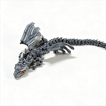 Articulated Black-and-White Swirl Dragon Figurine with Poseable Segments and Random Eye Color for Desktop Display