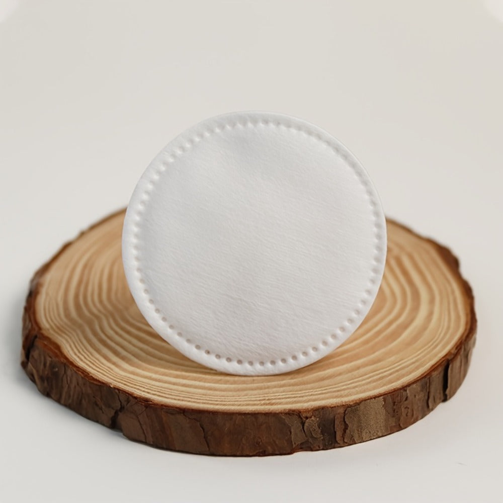 Round Cotton Makeup Remover Pads in 300- or 600-Count Packs with 5.8 cm Diameter and Stitched Edges