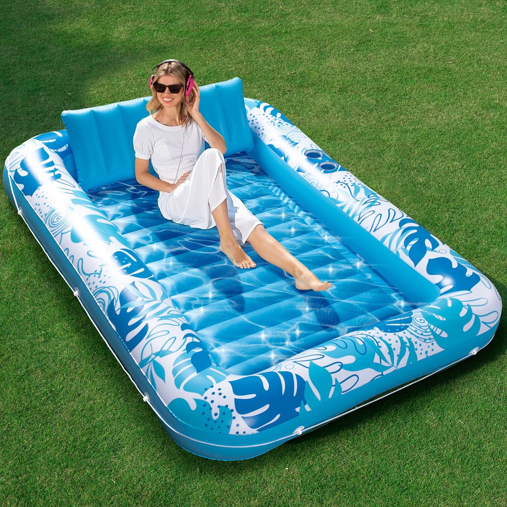 85 x 57-Inch Inflatable Pool Float Tanning Bed in Blue with Open Center, Ribbed Base and Raised Pillow