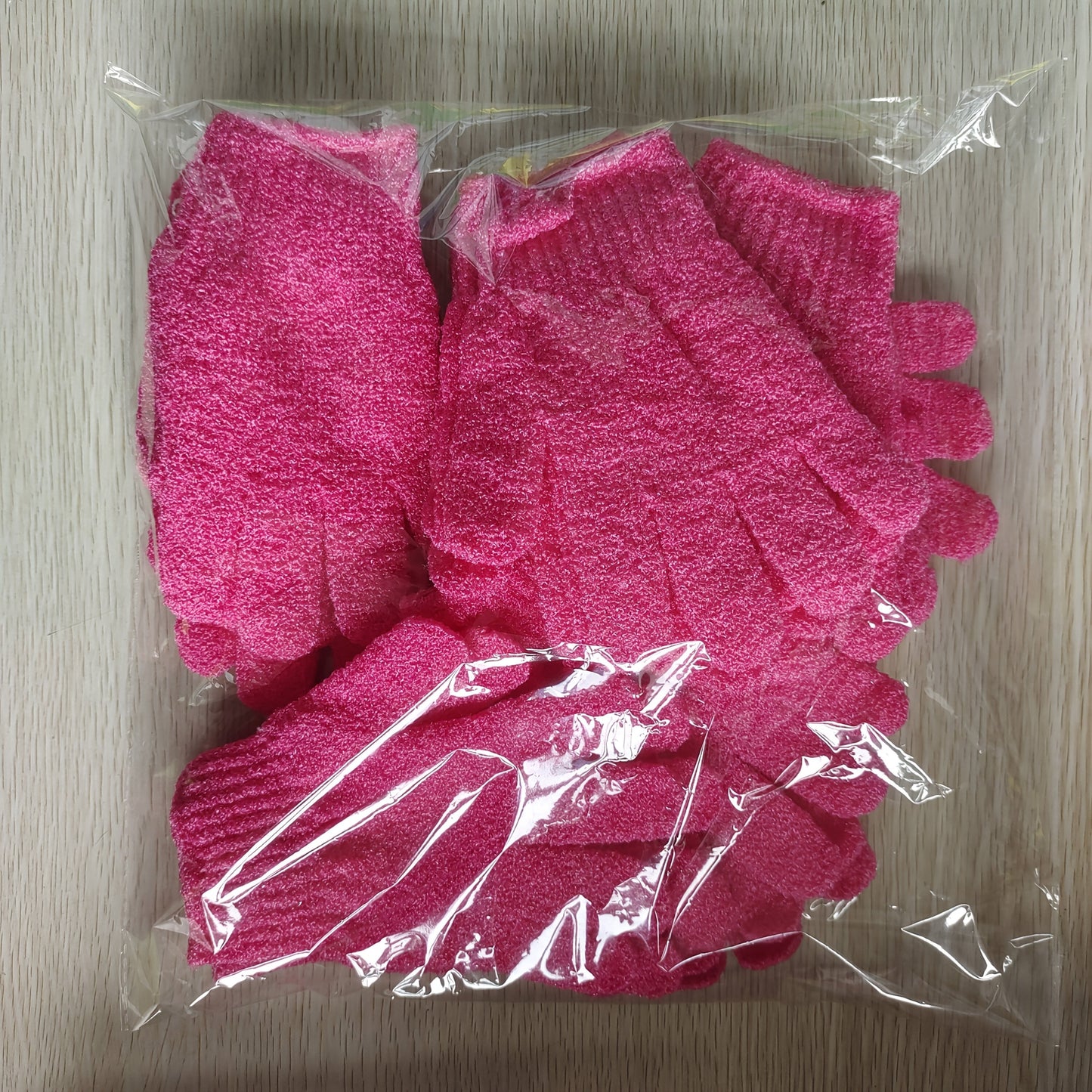 Twenty-Piece Rose-Red Exfoliating Shower Glove Set with Textured Five-Finger Mitt Design Pictured