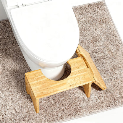 Foldable Bamboo Toilet Footstool with 7-Inch Height, Curved Opening and Anti-Slip Feet for Bathroom Use