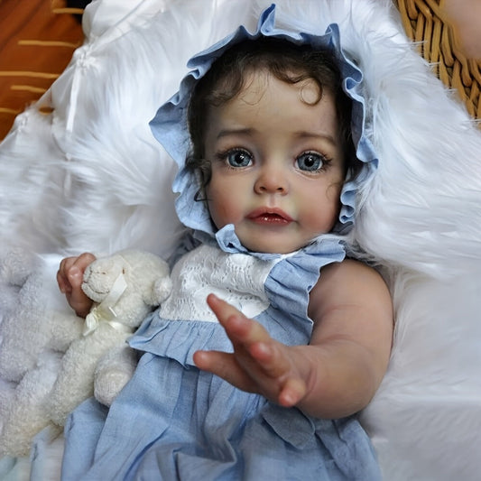 Reborn Baby Doll 48cm Soft Vinyl Toddler Design with Curly Dark Hair, Open Eyes and Blue Outfit