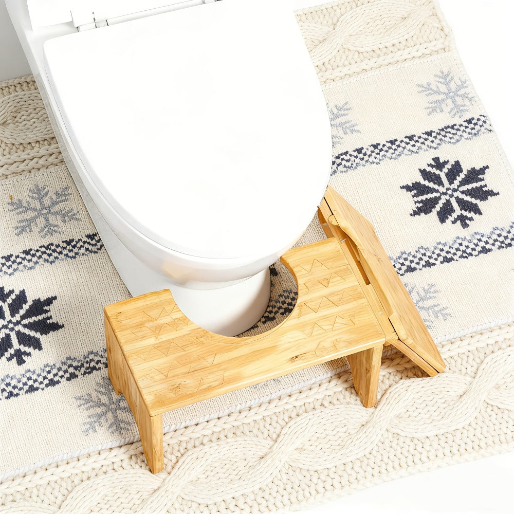 Foldable Bamboo Toilet Footstool with 7-Inch Height, Curved Opening and Anti-Slip Feet for Bathroom Use