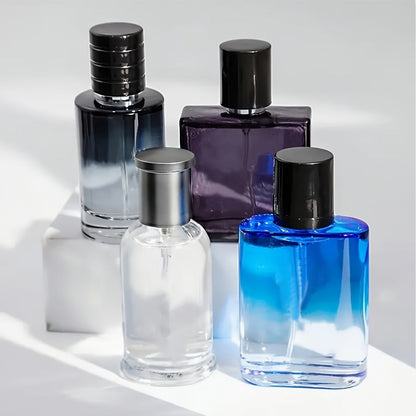Four-Piece Boxed Fragrance Spray Set with Blue, Clear and Purple Gradient Bottle Presentation