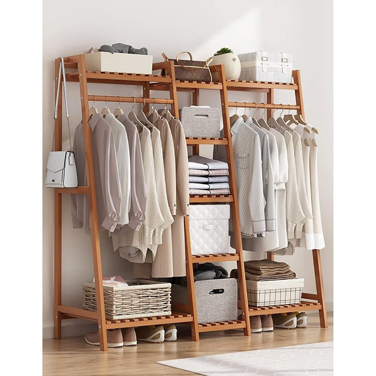 Clothes Rack shown in the brown, 51 inches option
